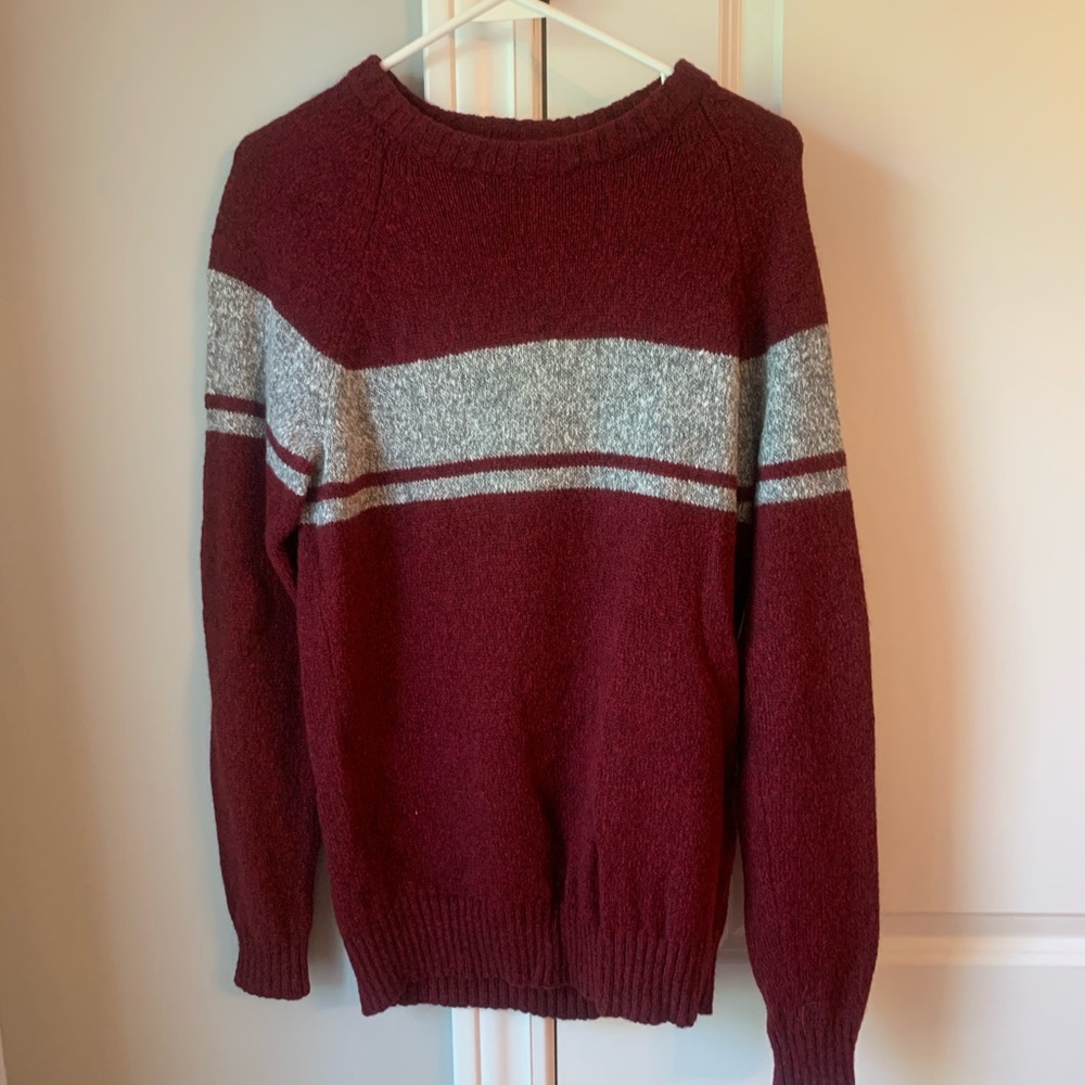 Red sweater with a grey stripe